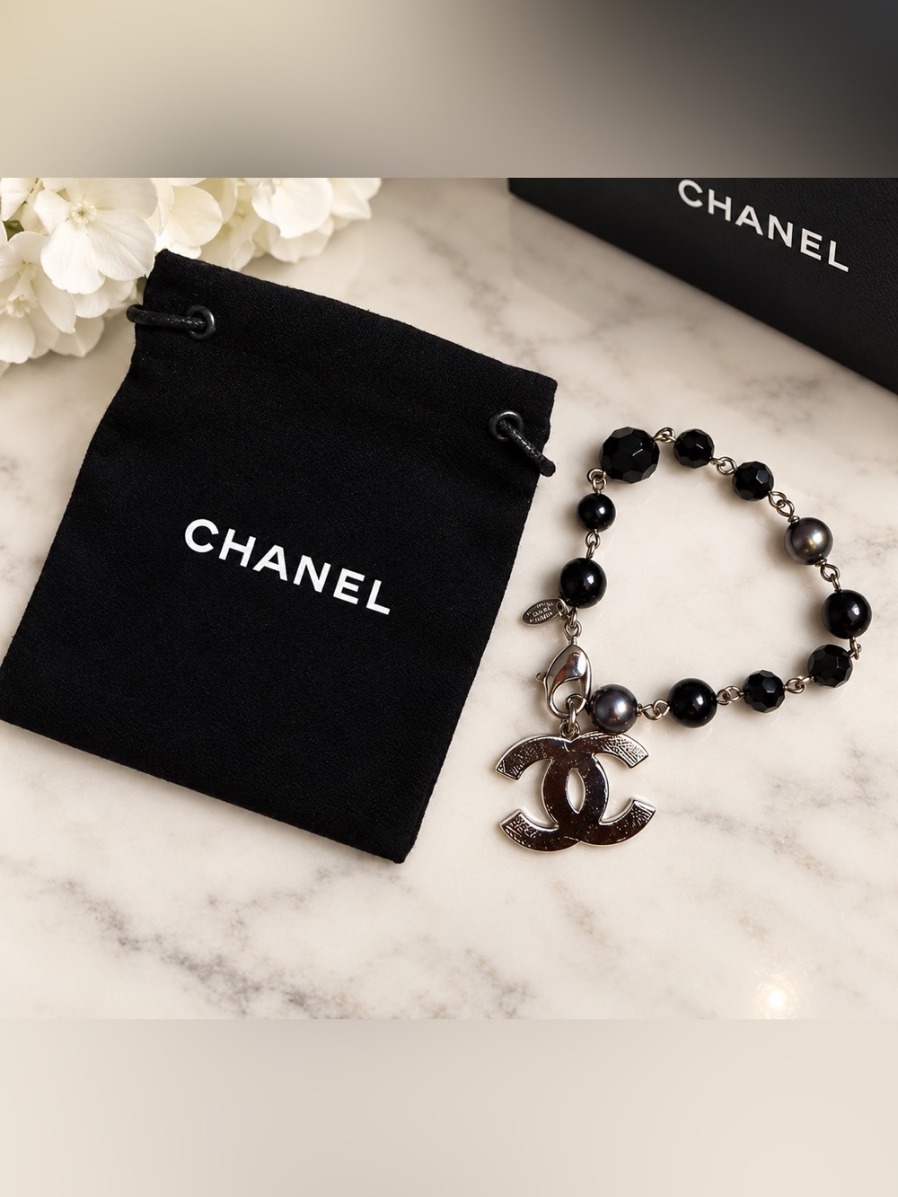 CHANEL Black Bead Bracelet with Silver CC Charm